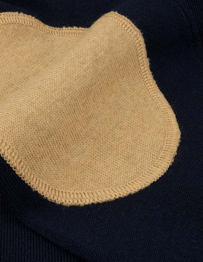 Luxe Baruffa-merinowollen crewneck in navy met elbow patches