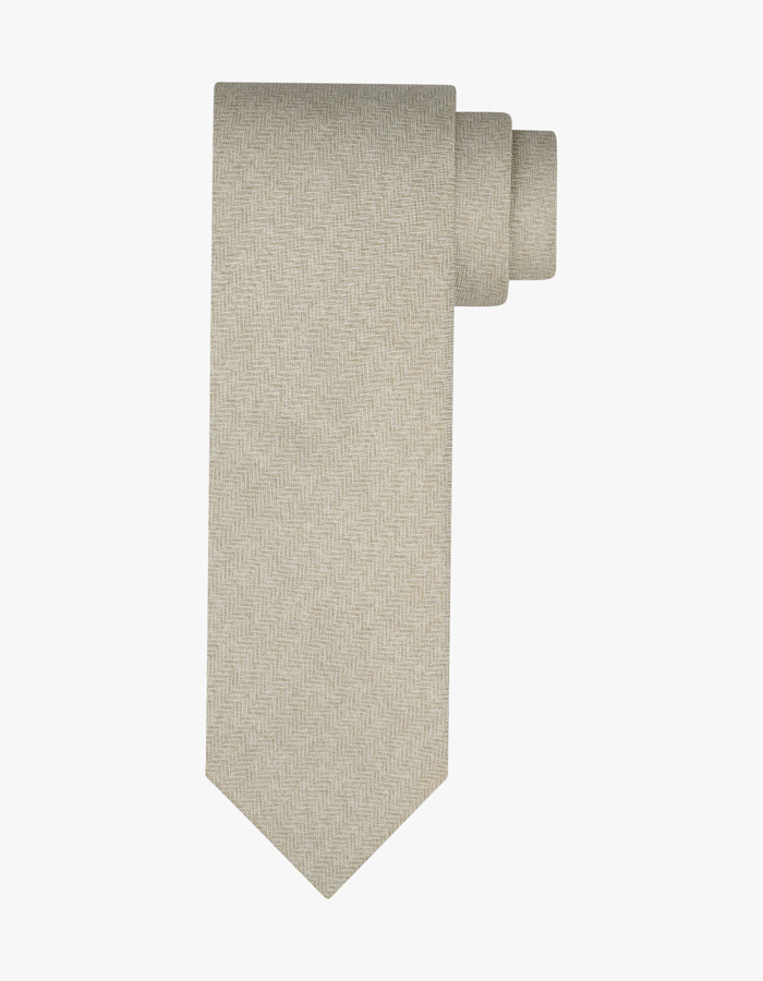 Das met visgraatstructuur in licht zand