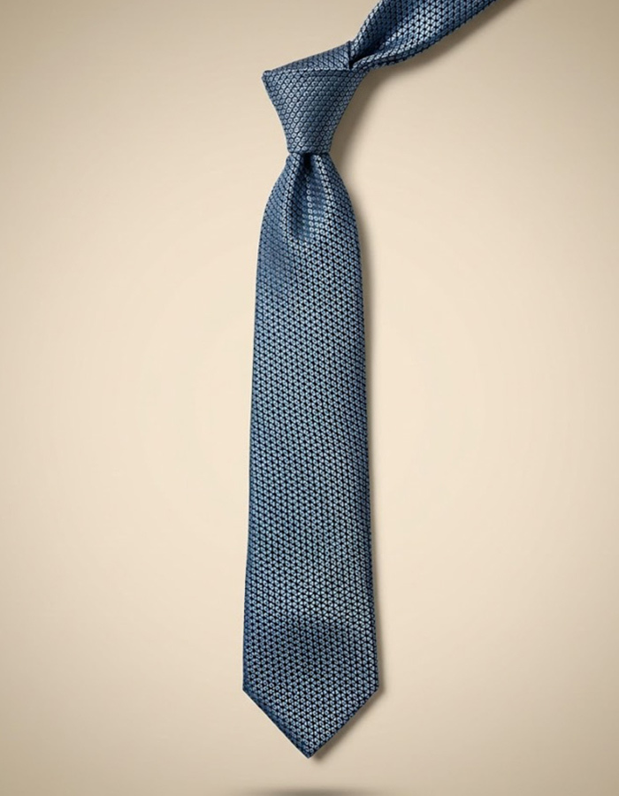 Zijden das met fijn microdessin in blauw