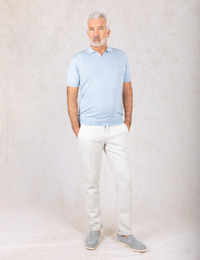 gebreide polo in lyocell merinowol lichtblauw