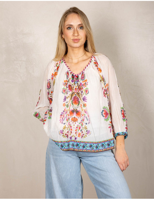 Rene Derhy bloes wit