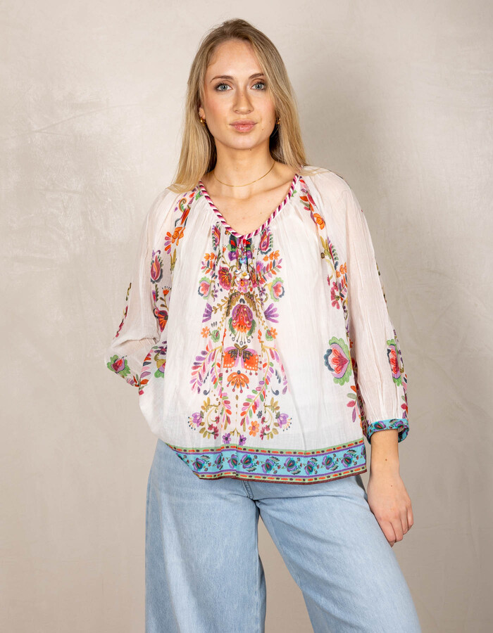 Rene Derhy bloes wit