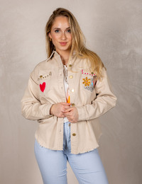 Blouse met kleurrijke applicaties en franjezoom