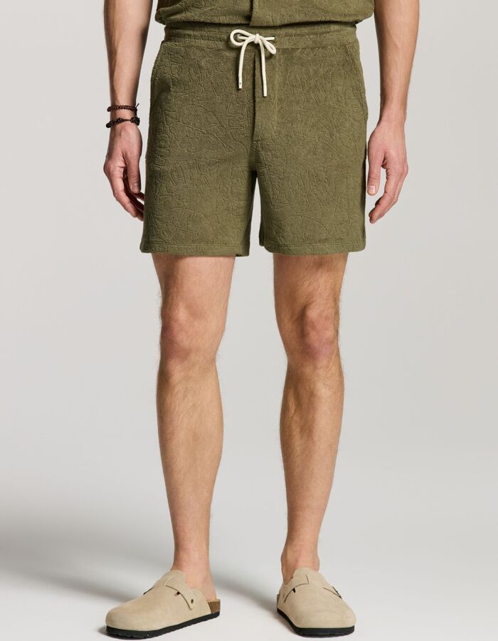 TONY badstof short met jacquard bladerenstructuur groen