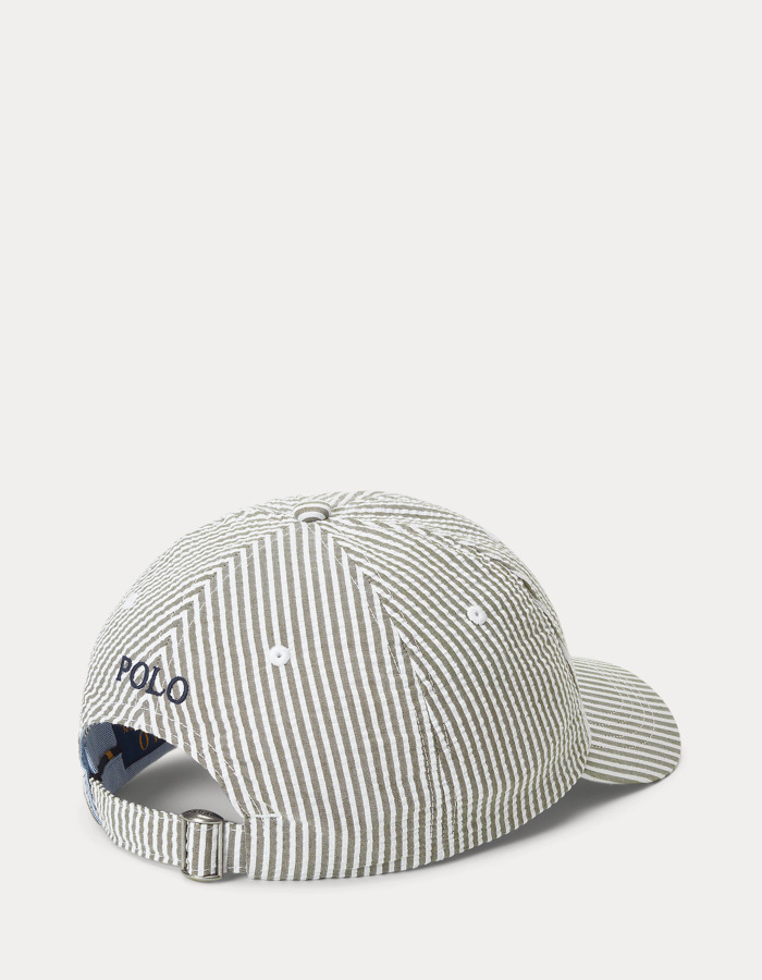 Seersucker pet met strepen en stretch olijfgroen