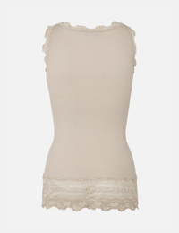 Top avec col rond et ourlet en dentelle