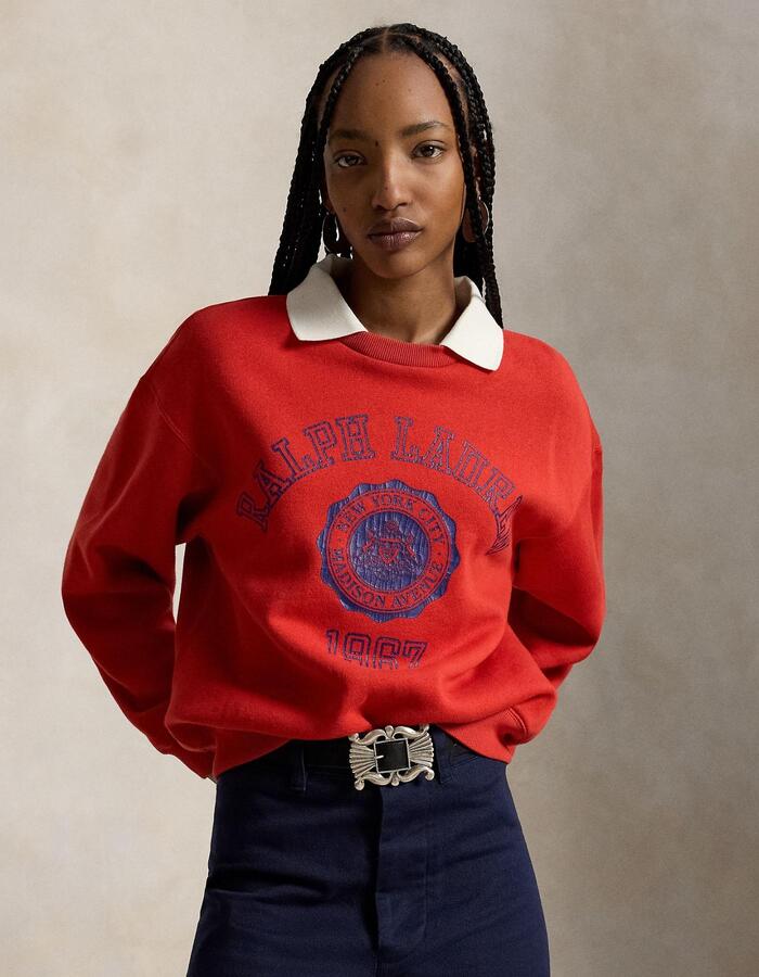 Fleece pull met polokraag en crest print