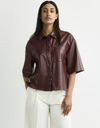 Horris - faux leather blouse met drukknoopsluiting