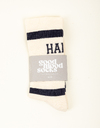 Chaussettes sportives avec rayures et détail "Happy"