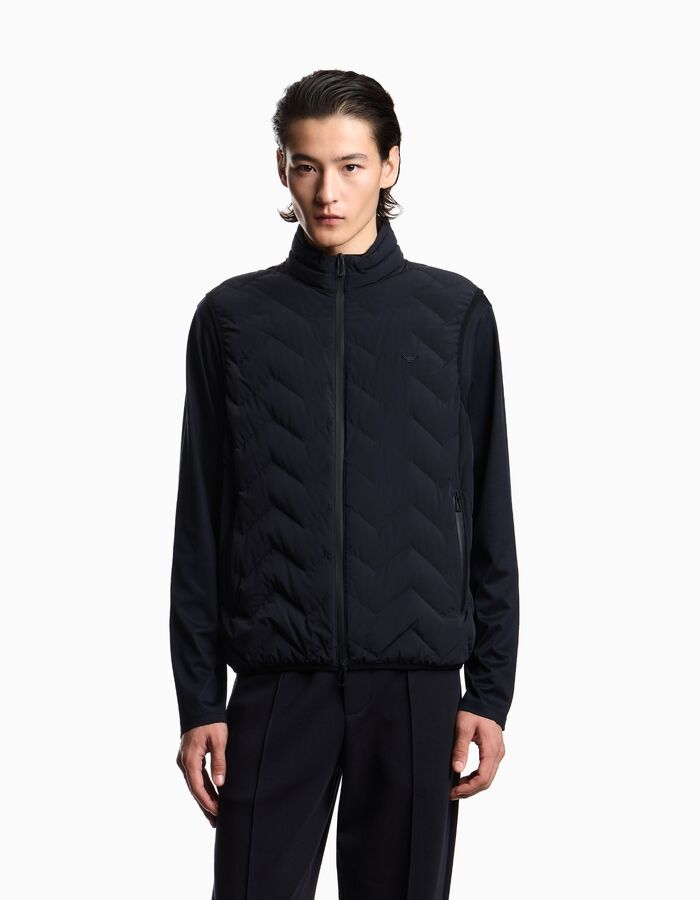 Bodywarmer met chevronstiksel en donsvulling