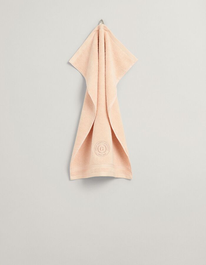 Crest Towel 30x50 handdoek met geborduurd embleem abrikoos