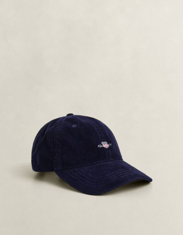 Corduroy pet met geborduurd schildlogo blauw