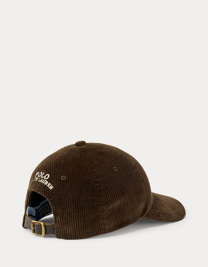 Corduroy pet met leren riempje donkerbruin