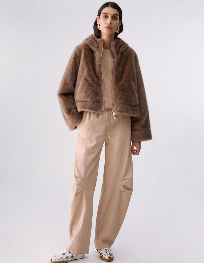 Omkeerbare teddy jas met trekkoord beige