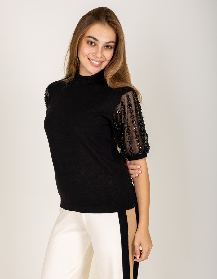 Pull en maille fine à manches transparentes ornées de sequins noir